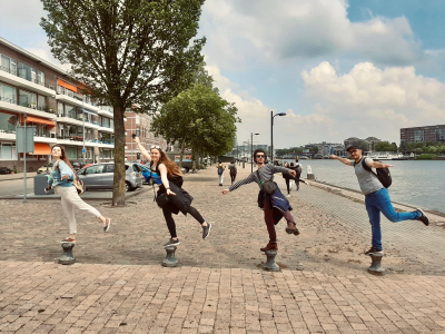 thumbnail view of Faces of Study Abroad - Amanda Grace Stine - Netherlands Spring 2020 - Balancing Act - It took many photos to get one where we were all balancing and not falling off the posts