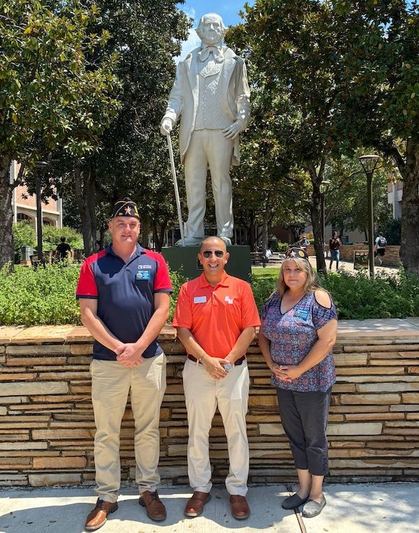 Fernando Chavez (center) poses with Ryan Lang and Roxanne Moss, American Legion Sam Houston Post 95.