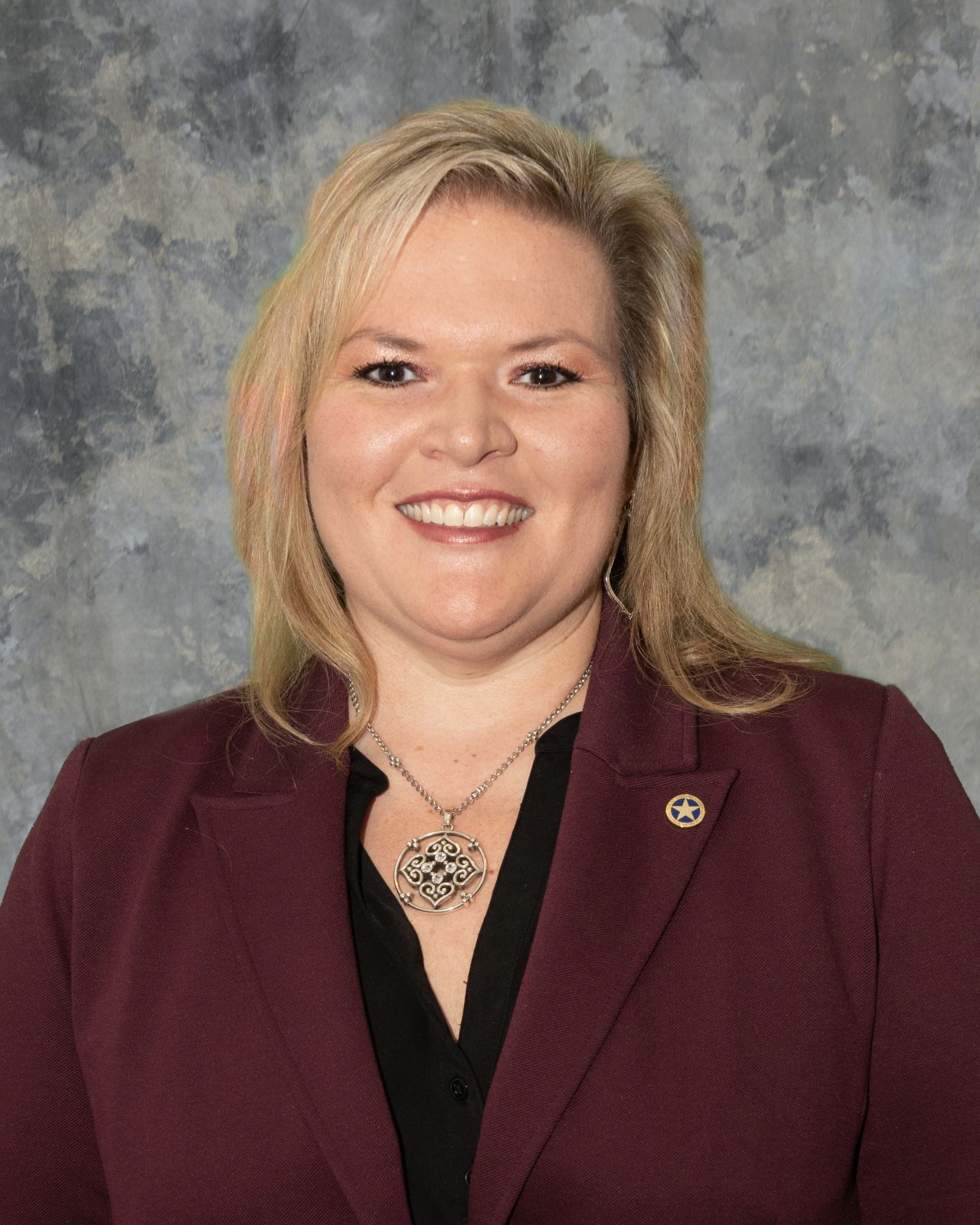 Erica Montalvan smiles for a photo.