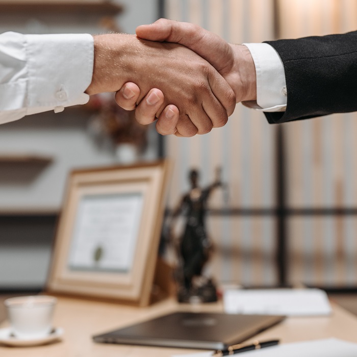 two people handshaking